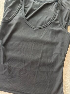 Lot of 4 black tank tops